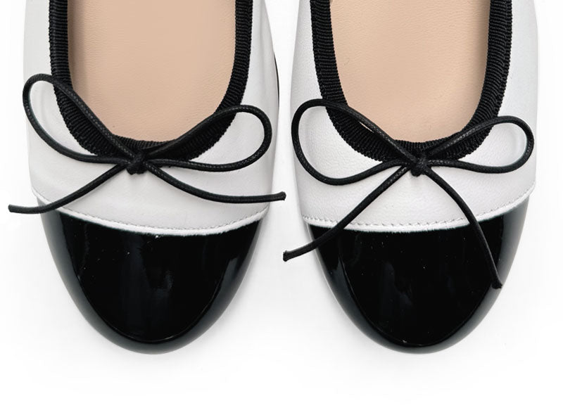 Ballerine bianche in pelle con tacco alto e punta in vernice