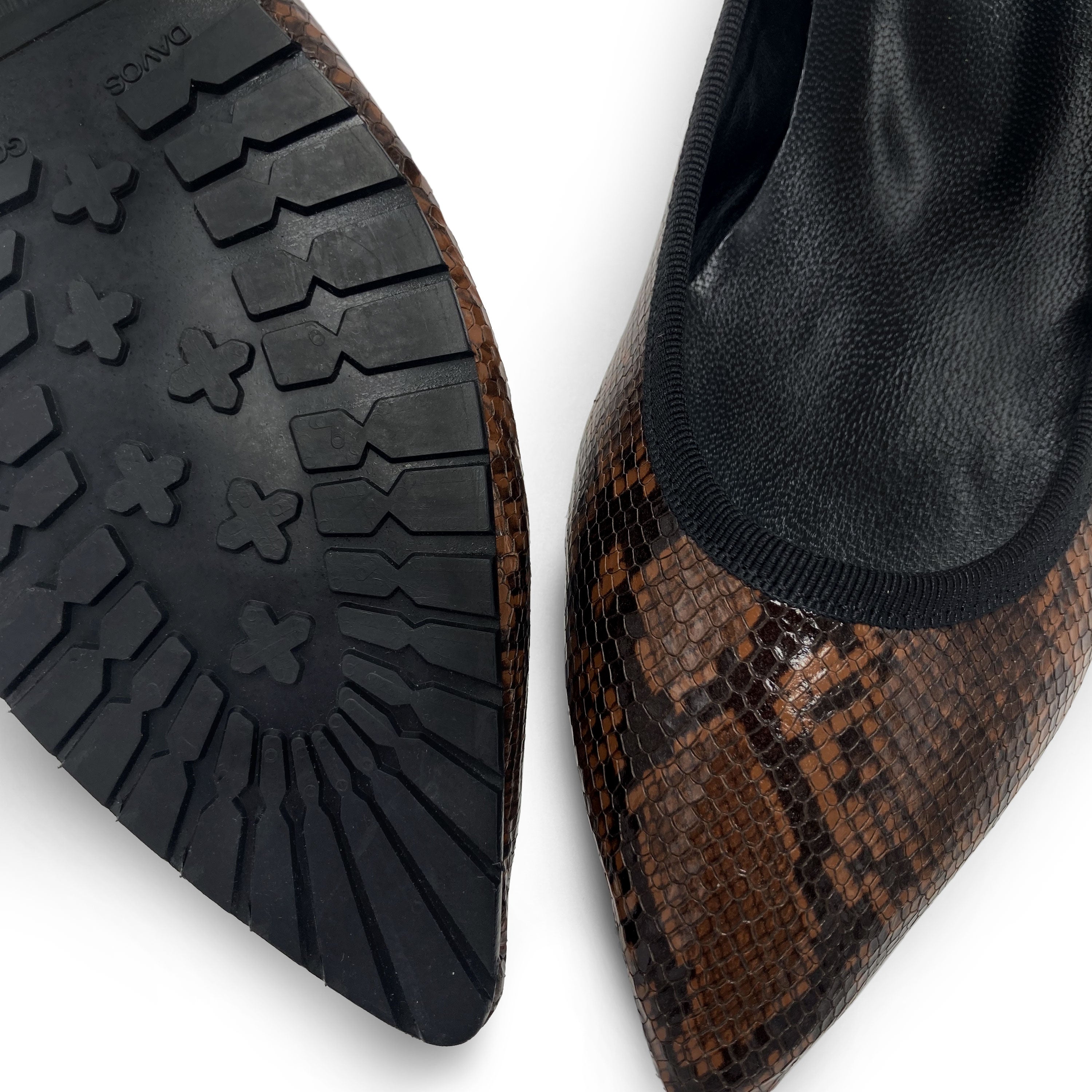 Pointed toe brown animal print leather flats