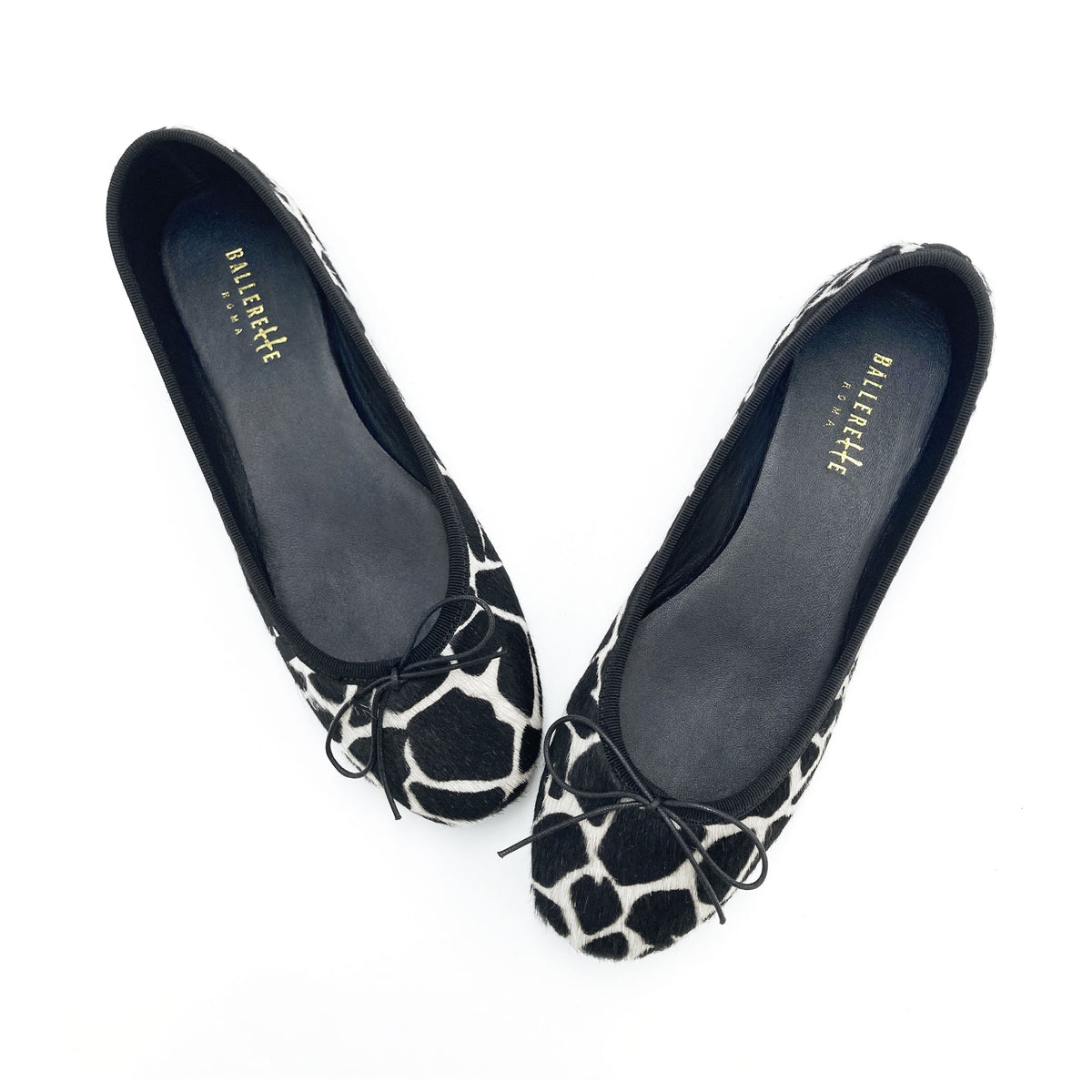 Ballerine animalier in cavallino maculato bianco e nero