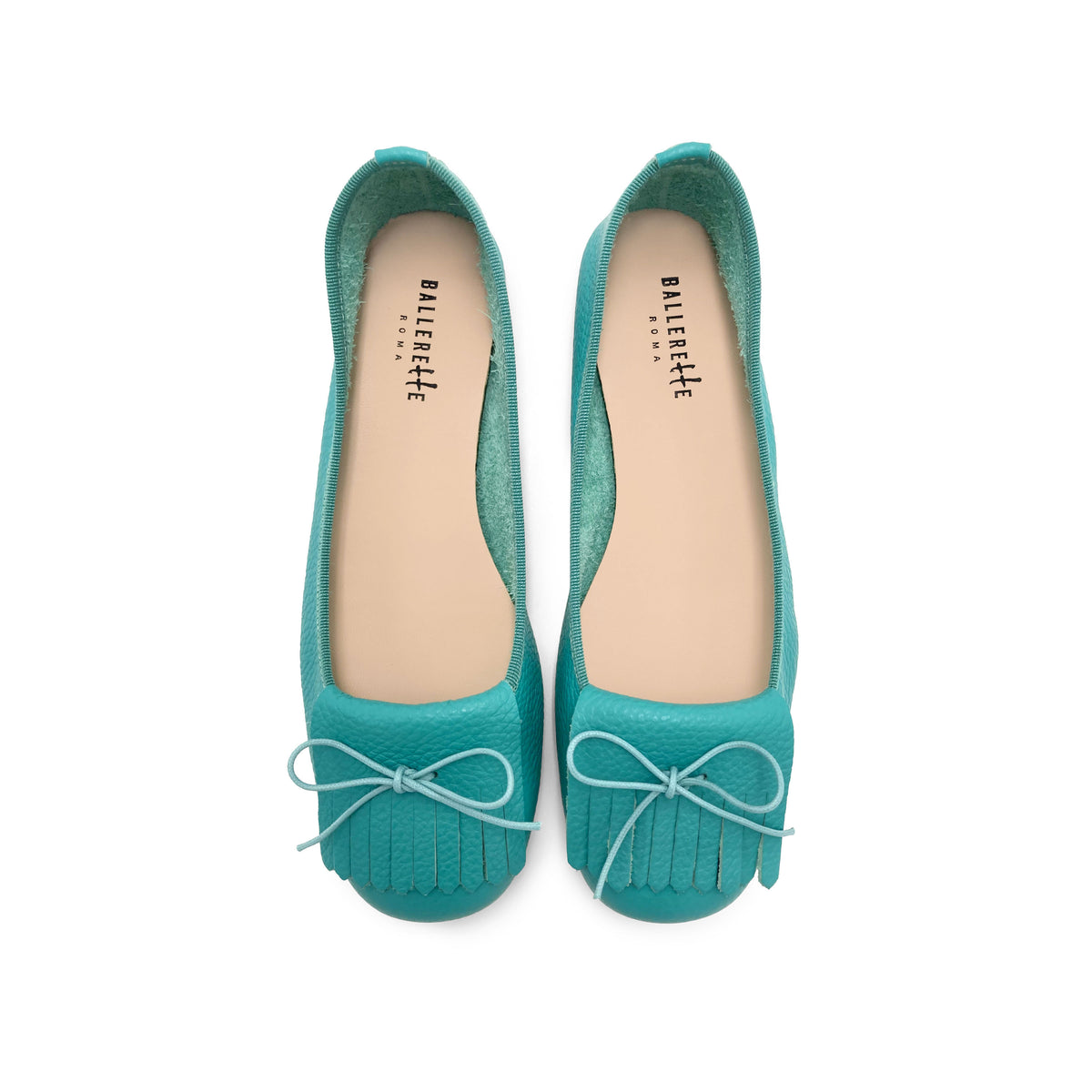 Women's aqua blue leather moccasins with fringes