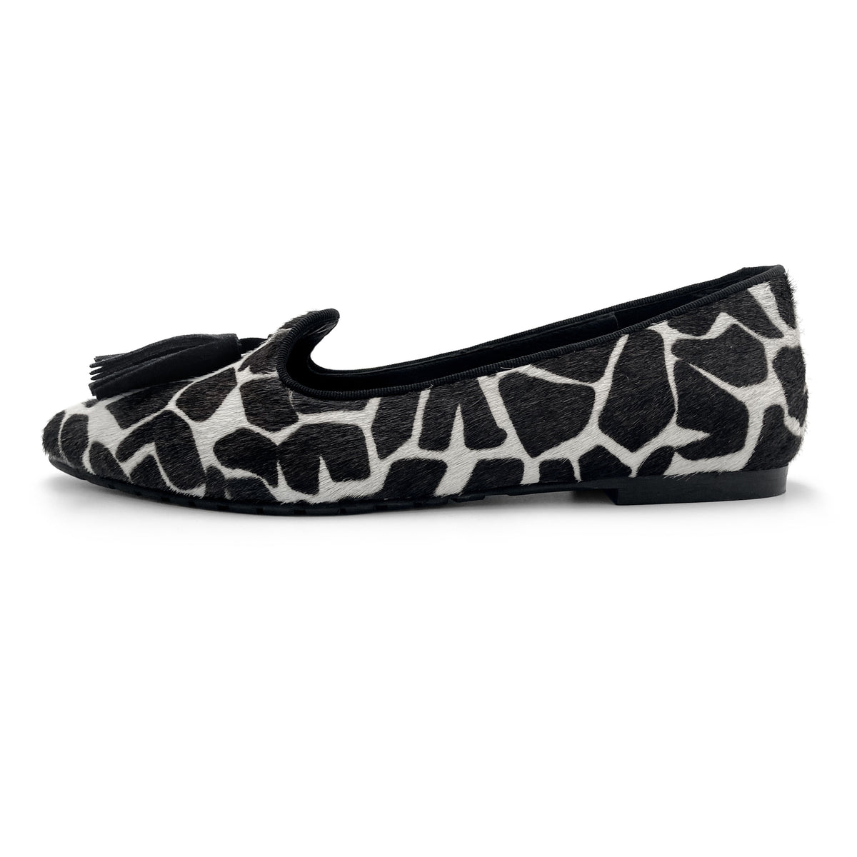 Women's black and white animal print pointed toe moccasins
