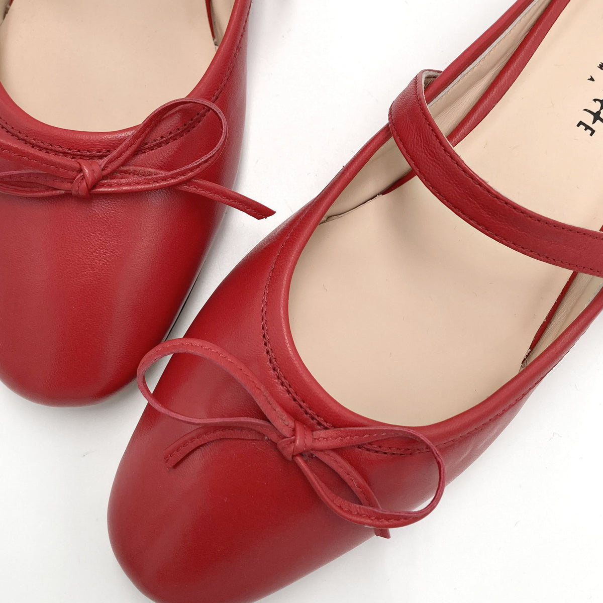Red leather mule ballet flats with handcrafted sacchetto construction