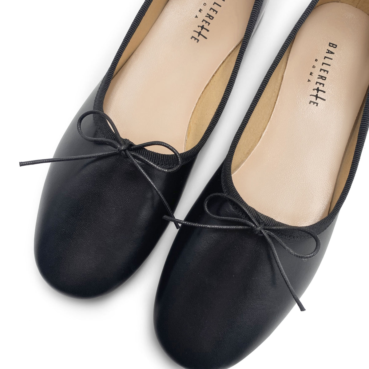 Ballerine "glove shoes" nere accollate in pelle