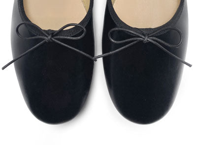 Ballerine "glove shoes" nere accollate in pelle