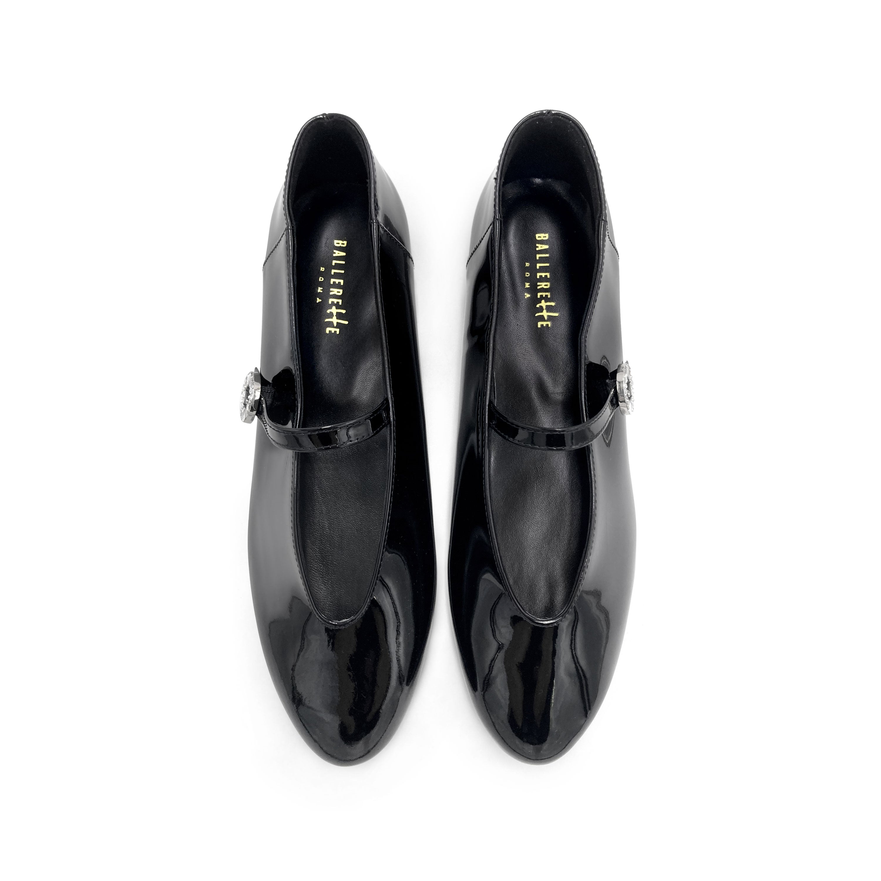 Ballerine Mary Jane nere in vernice con scollo a V e cinturino gioiello