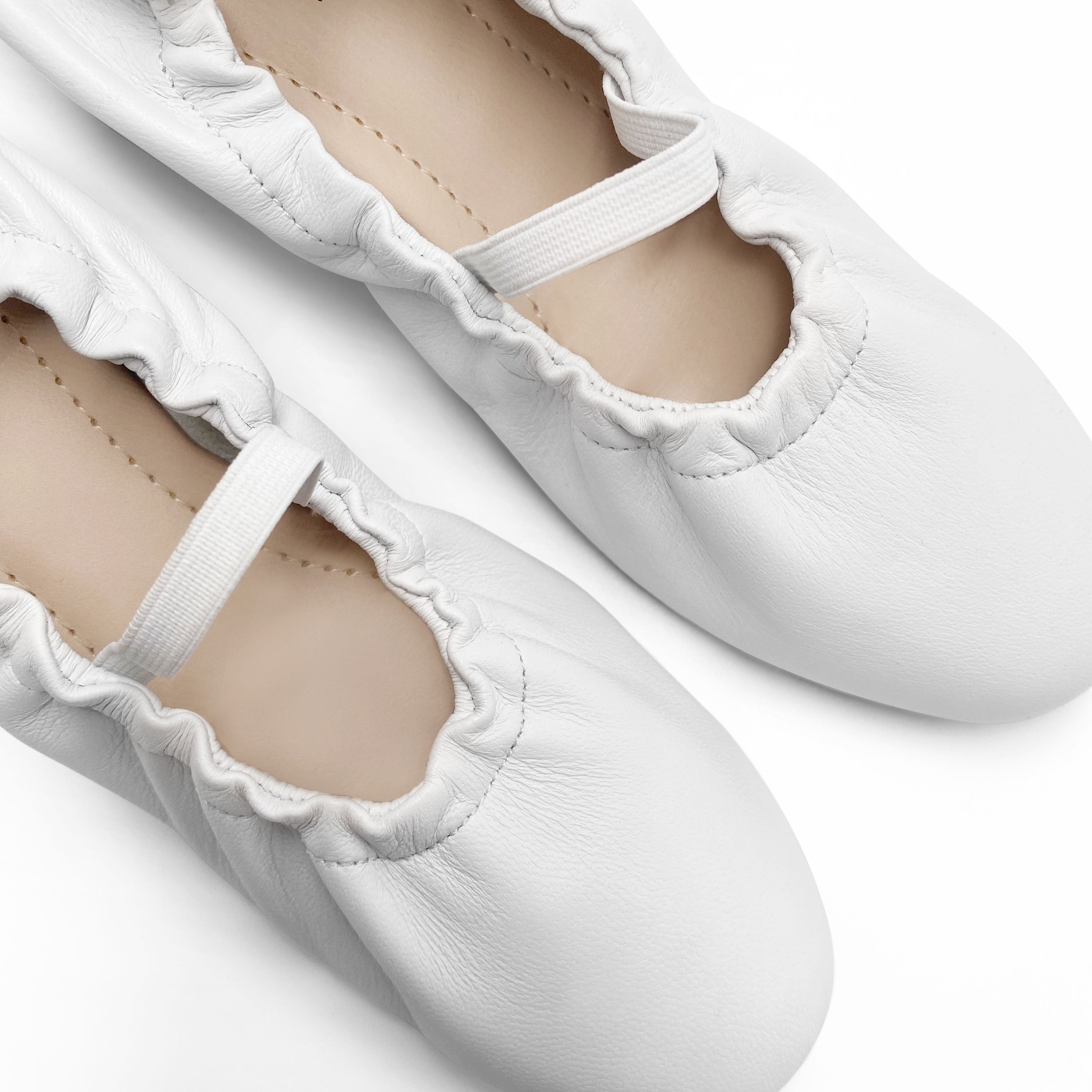 Ballerine accollate bianche in pelle con cinturino elastico