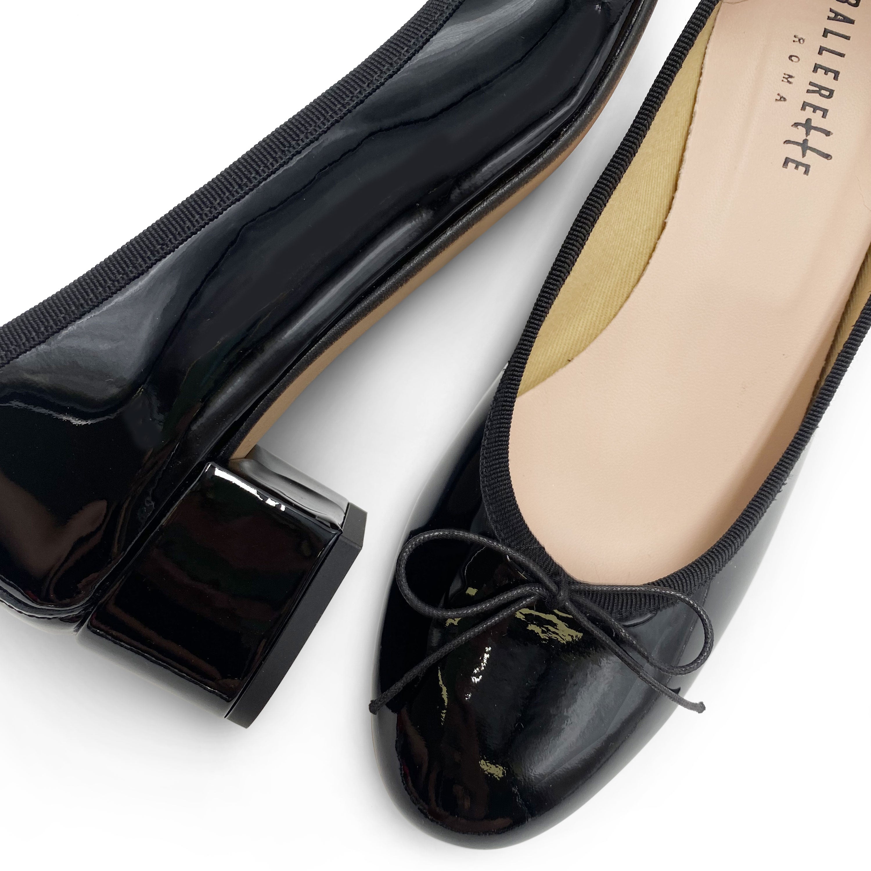 Schwarze Ballerinas aus Lackleder mit hohem Absatz