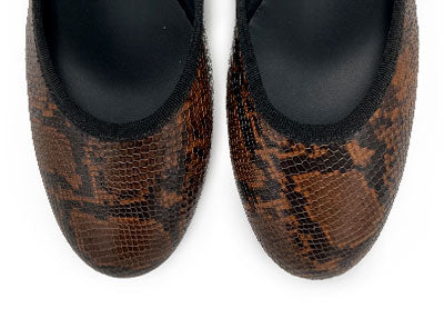 Brown animal print leather flats with high heel