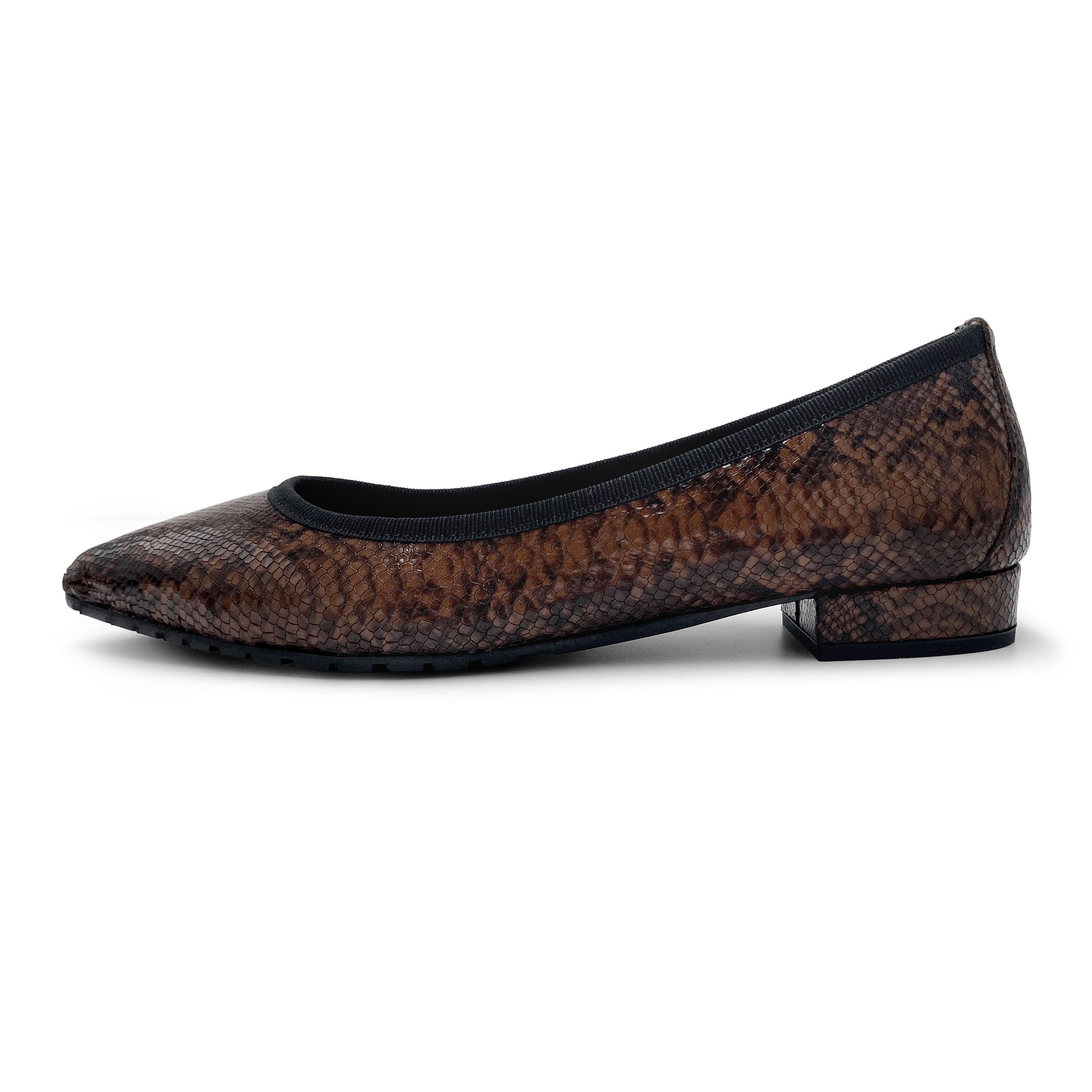 Pointed toe brown animal print leather flats
