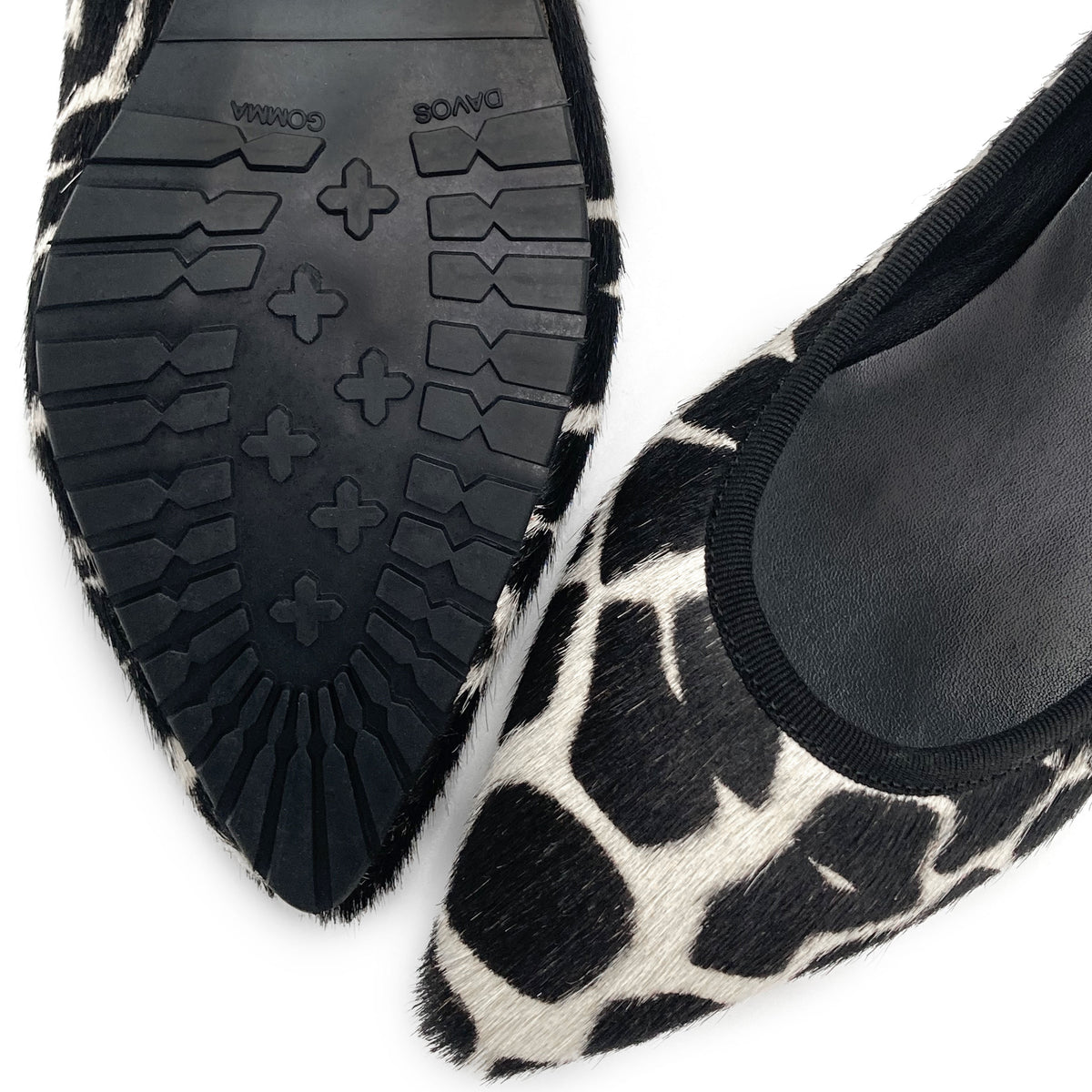 Ballerine a punta animalier in cavallino maculato bianco e nero