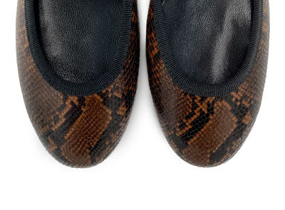 Round toe brown animal print leather flats