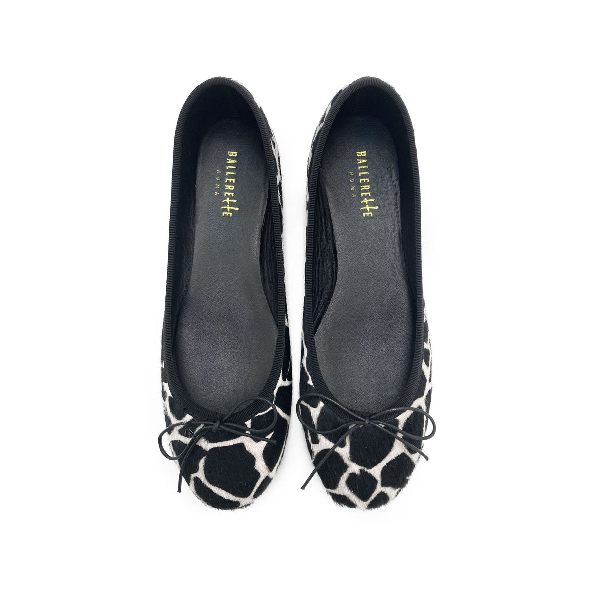 Ballerine animalier in cavallino maculato bianco e nero