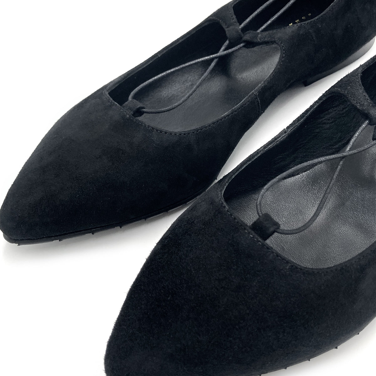 Black suede ballet flats with straps