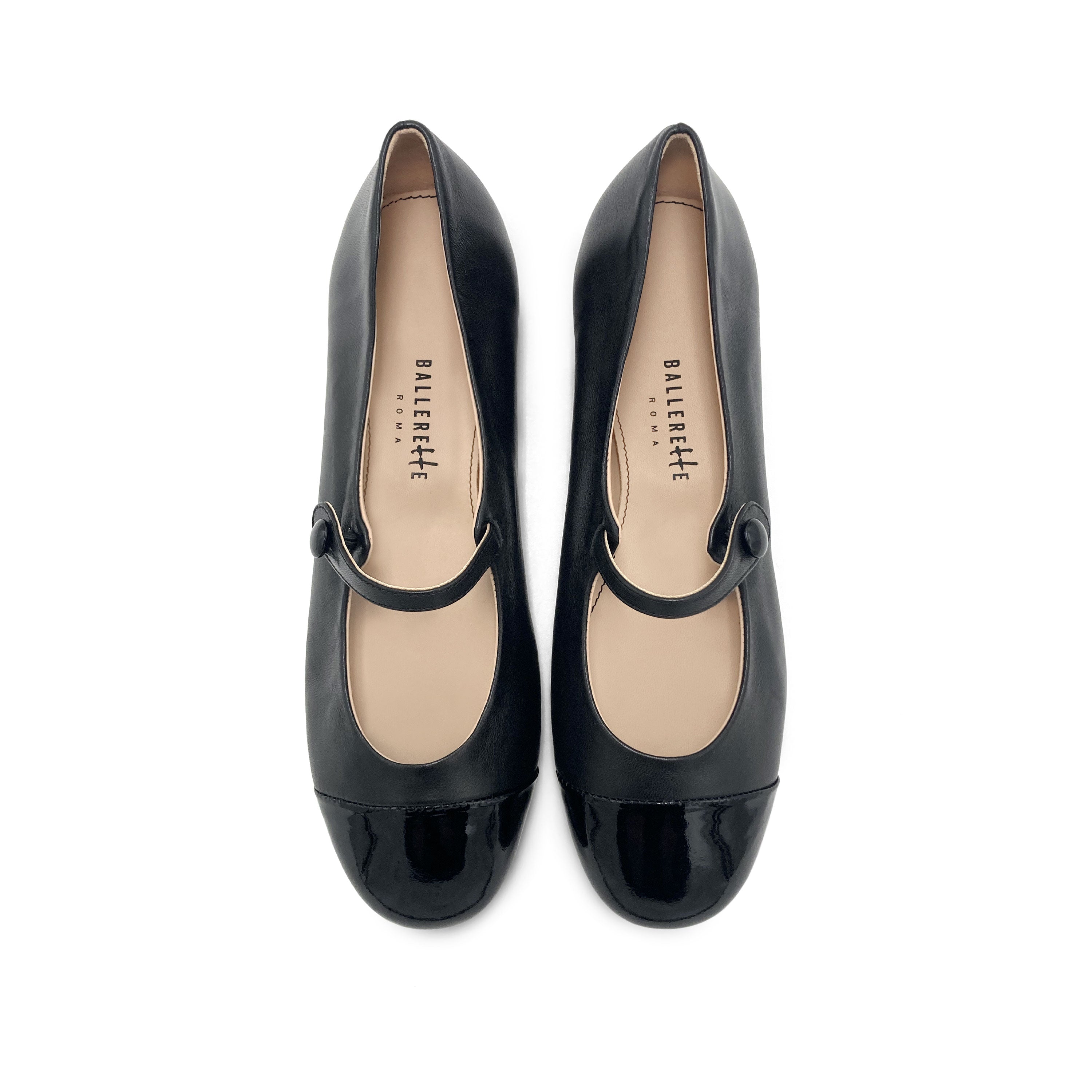 Black leather ballet flats with patent leather strap and toe
