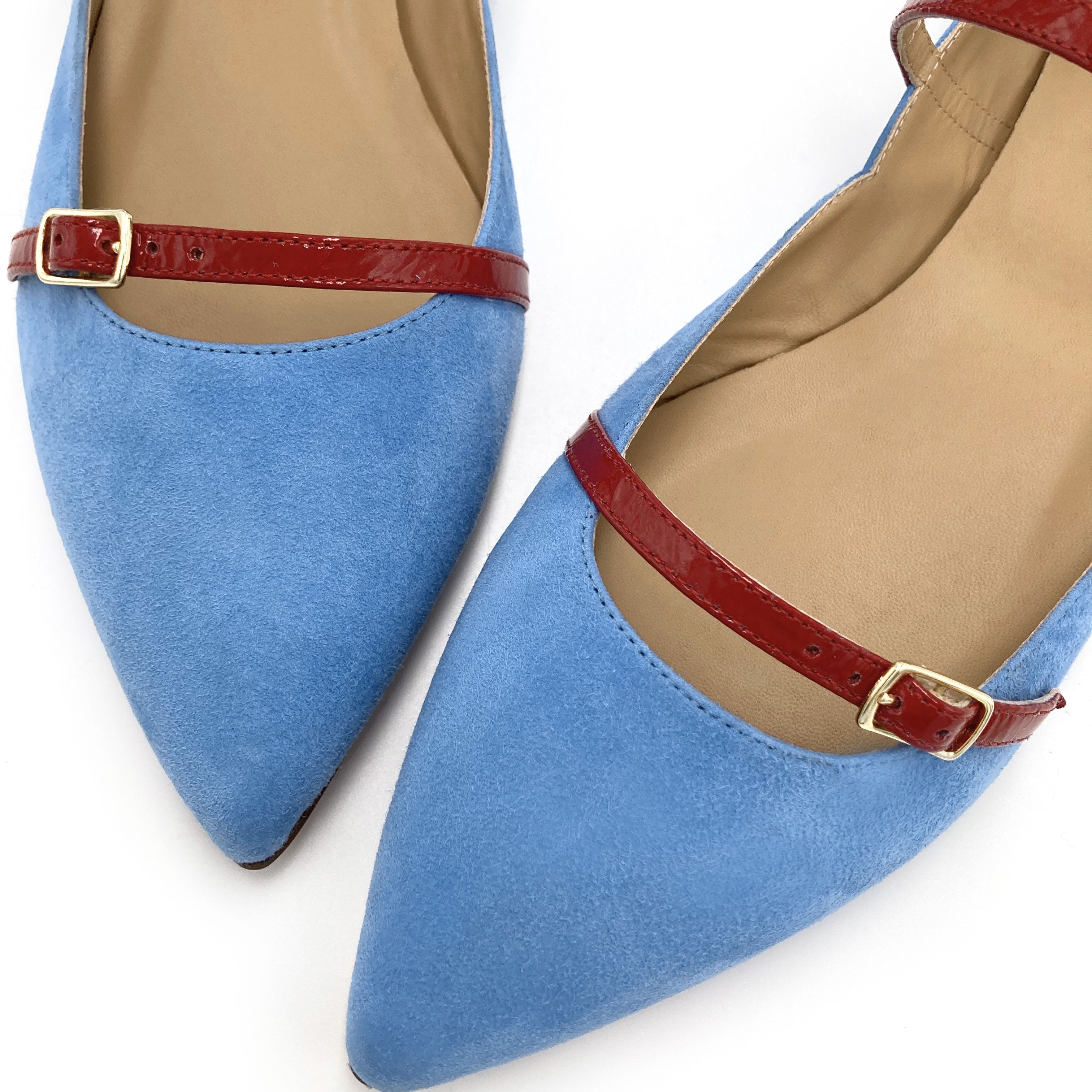 Denim blue suede pointed ballet flats with red straps