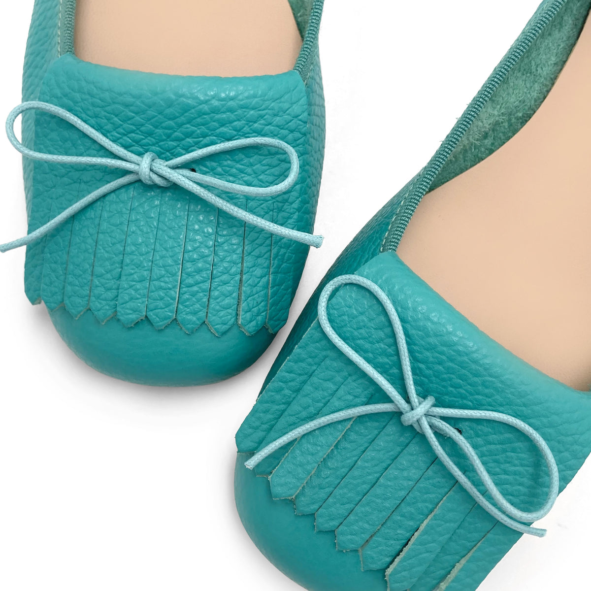 Mocassins femme en cuir bleu aqua a frange