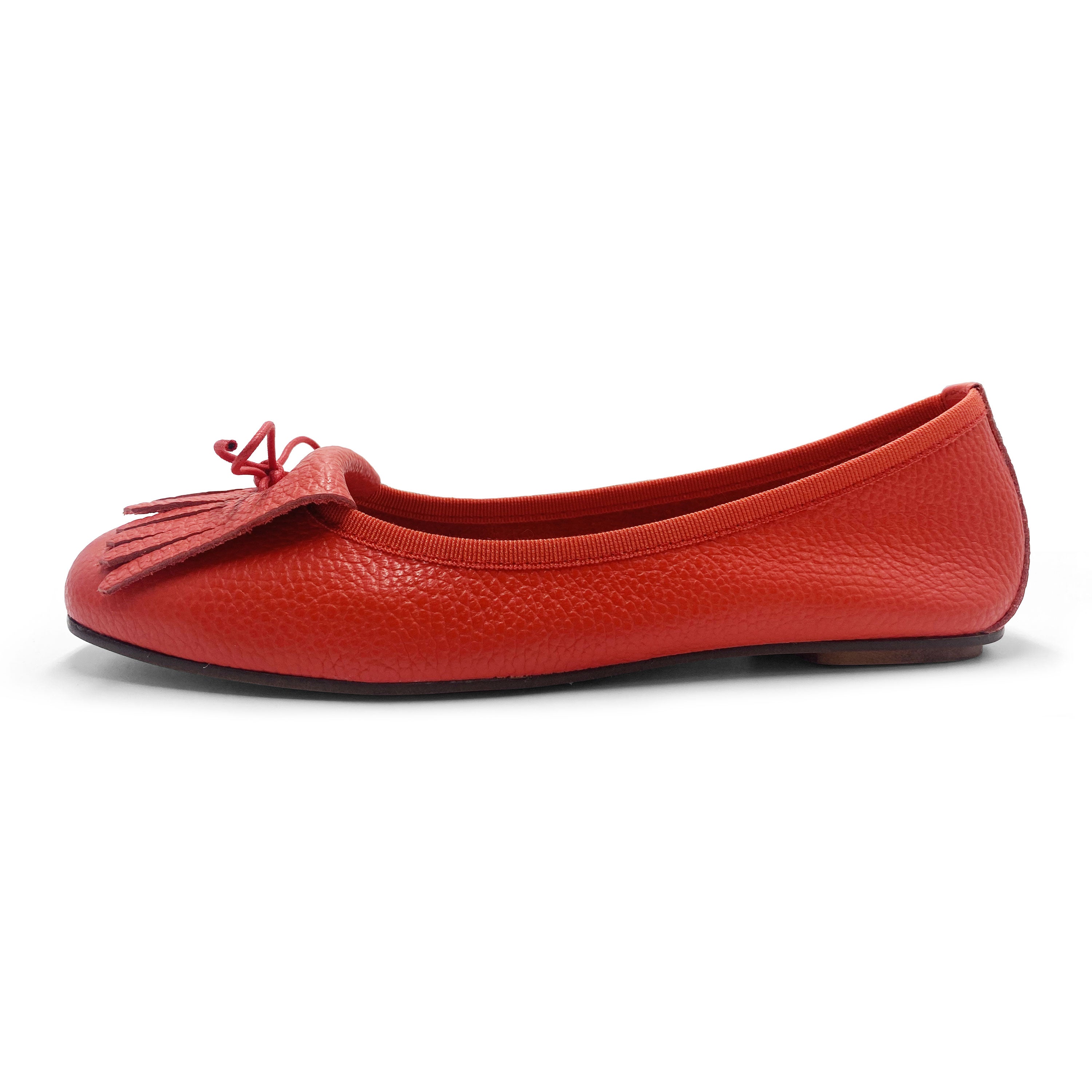 Mocasines rojos de piel con flecos 
